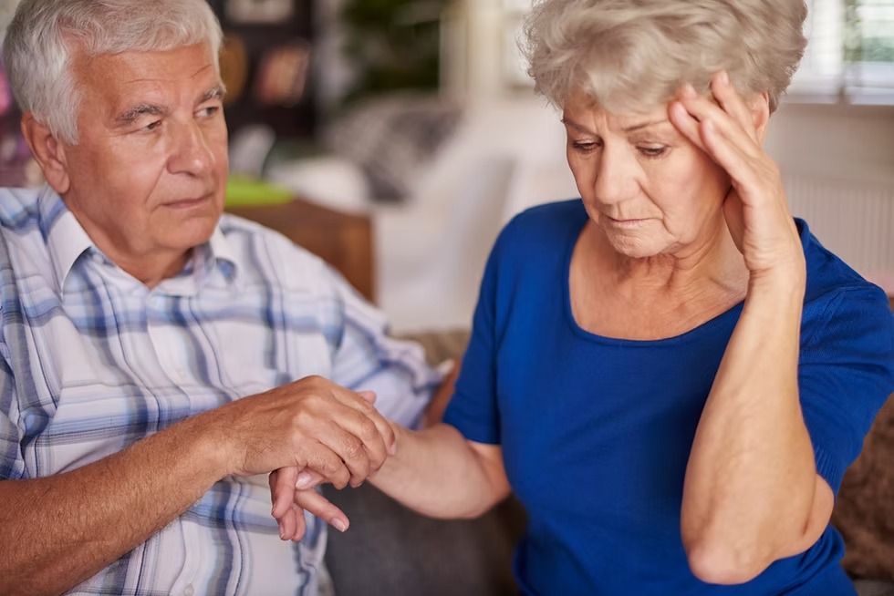 A family member showing concern as a loved one experiences a memory moment