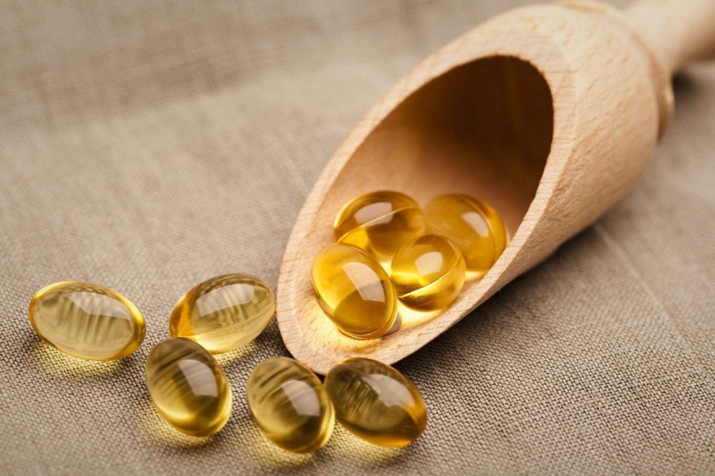 Golden softgel capsules from a men’s prostate wellness supplement