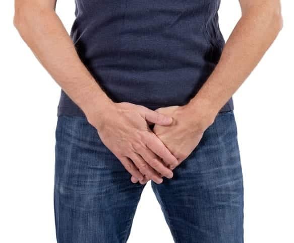 Man experiencing urinary urgency symptoms